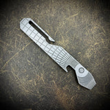 OZ Pocket Pry Bar. Hardened Z-FiNit steel with "Radial Frag" Milling. Acid etched, then stonewashed.