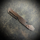 OZ Pocket Pry Bar. Hardened Z-FiNit steel with "Radial Frag" Milling. Laser colored Dark Bronze.